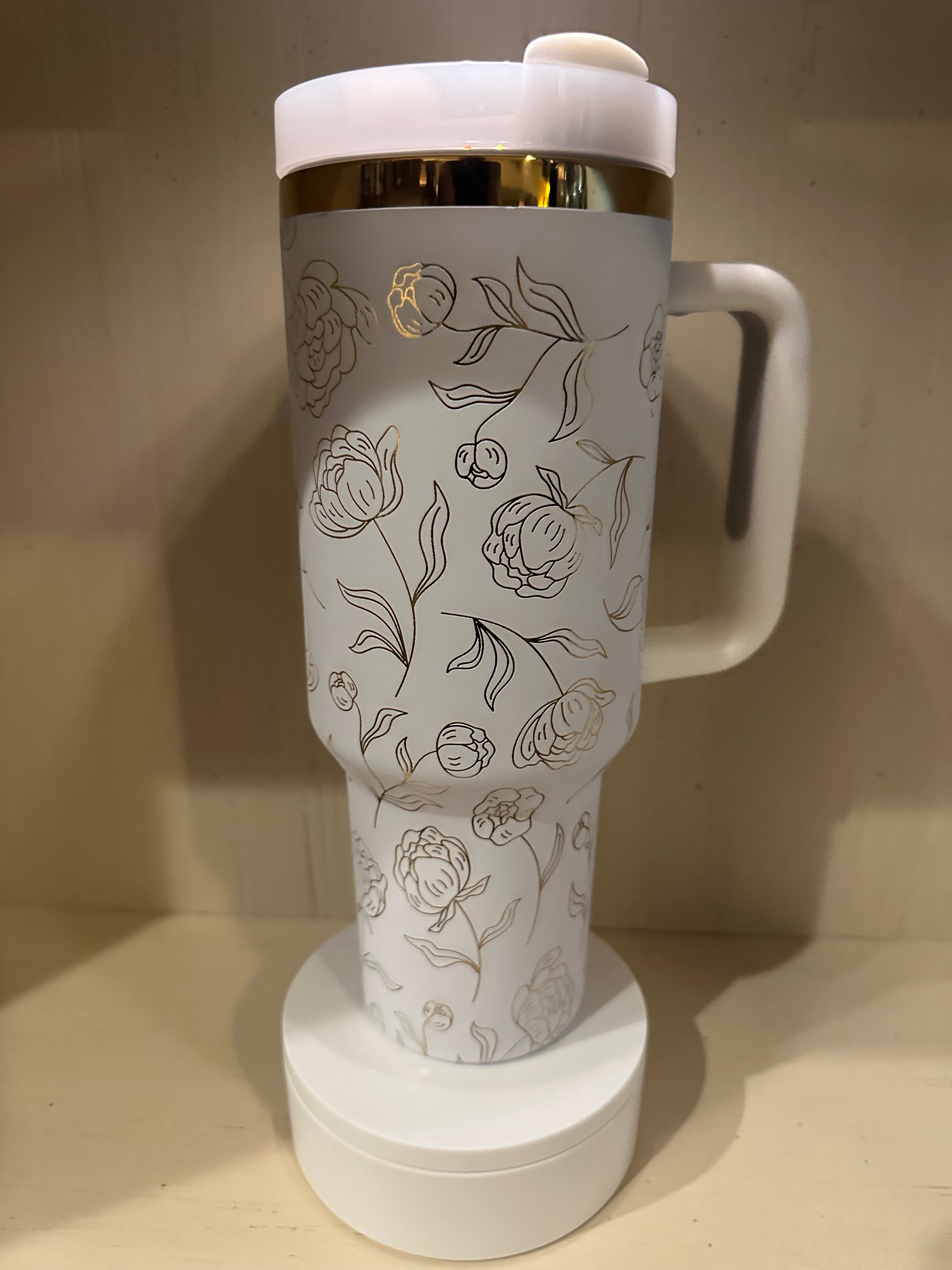 White and gold 40oz laser engraved tumbler Flowers