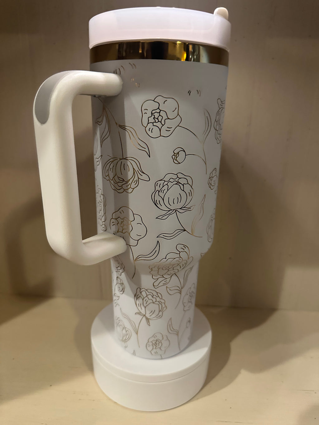 White and gold 40oz laser engraved tumbler Flowers
